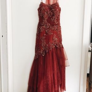 Garnet, sequined mermaid gown.